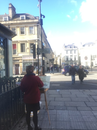 woman painting the Abbey in Bath (so cool to see someone on the side painting something so beautiful)